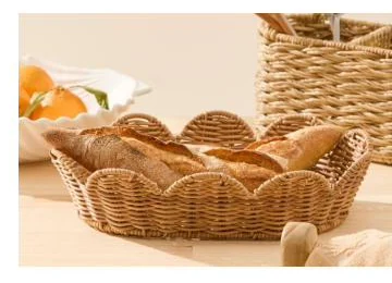 Scalloped rattan bread basket shown holding baguettes - HNH BK2593