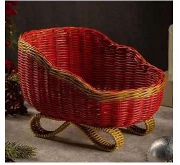 Red rattan sleigh basket on curled gold runners - HNH BK2561