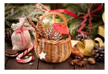 Rattan gift basket shown with festive treats - HNH 29044